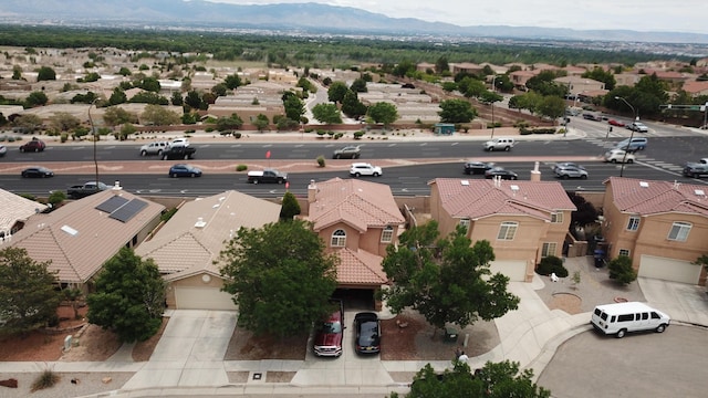 4608 Stafford Pl NW, Albuquerque, NM 87120 - aerial perspective of suburban area featuring a mountain backdrop
