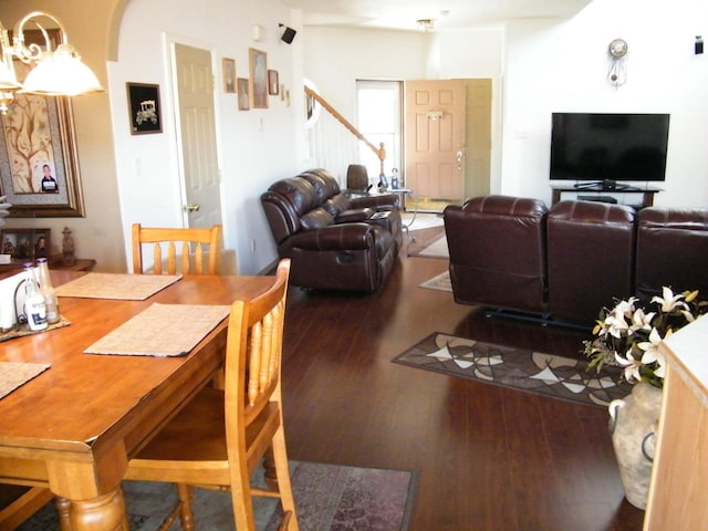4608 Stafford Pl NW, Albuquerque, NM 87120 - dining area with stairs, wood finished floors, and arched walkways