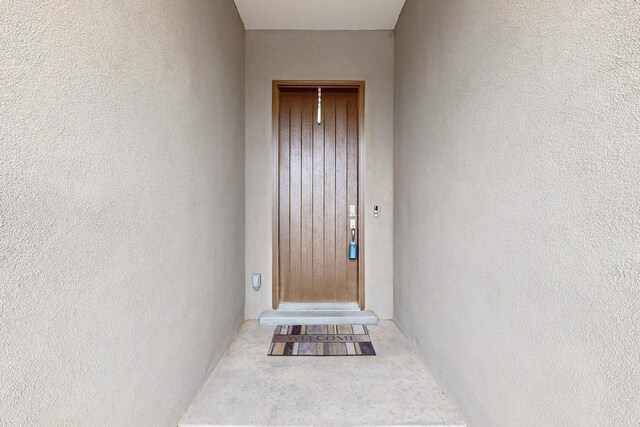 6854 Cleary Loop NE, Rio Rancho, NM 87144 - property entrance featuring stucco siding