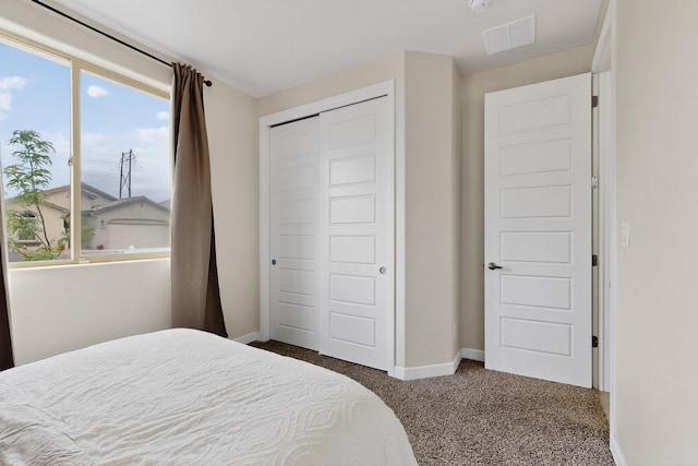 6854 Cleary Loop NE, Rio Rancho, NM 87144 - bedroom with a closet and carpet