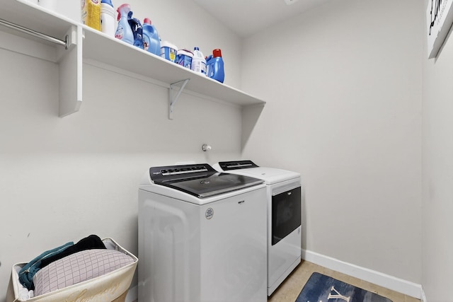 6854 Cleary Loop NE, Rio Rancho, NM 87144 - laundry area with washing machine and dryer and baseboards