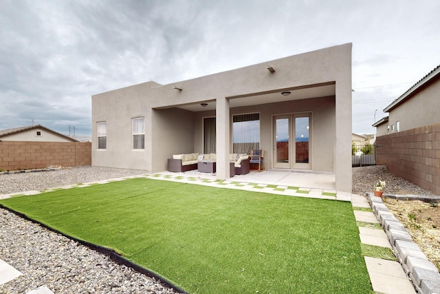 6854 Cleary Loop NE, Rio Rancho, NM 87144 - rear view of property featuring stucco siding, an outdoor hangout area, and a fenced backyard
