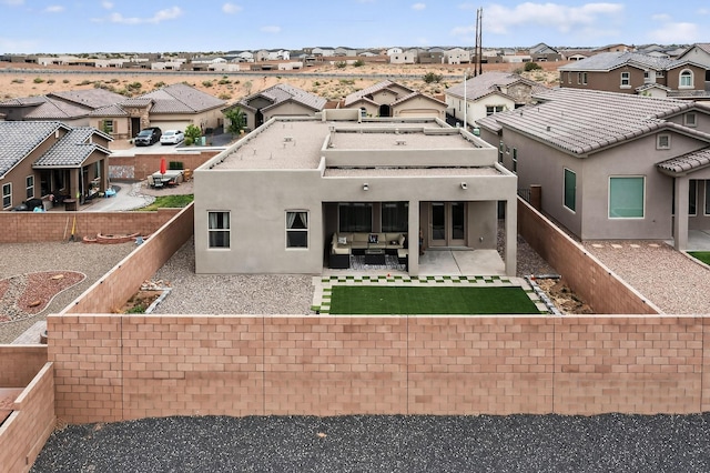 6854 Cleary Loop NE, Rio Rancho, NM 87144 - rear view of property featuring a residential view, a fenced backyard, a patio area, and stucco siding