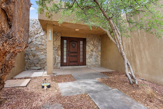 8320 Cherry Hills Dr NE, Albuquerque, NM 87111 - property entrance with stone siding and stucco siding