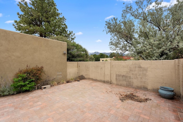 8320 Cherry Hills Dr NE, Albuquerque, NM 87111 - view of patio with a mountain view