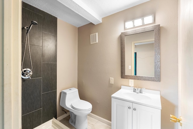 8320 Cherry Hills Dr NE, Albuquerque, NM 87111 - bathroom with vanity, tiled shower, toilet, and baseboards