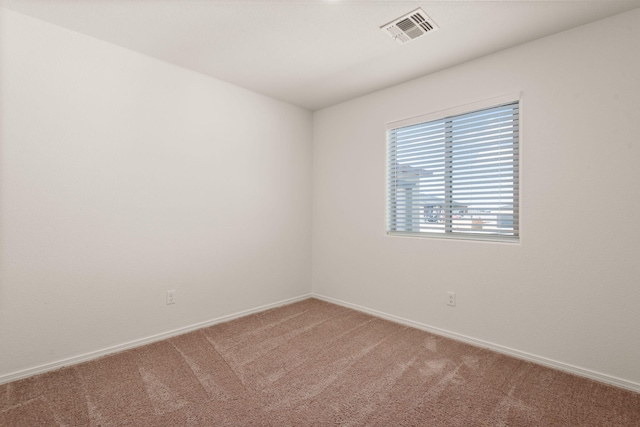 2425 Desi Loop, Belen, NM 87002 - unfurnished room with light carpet and baseboards