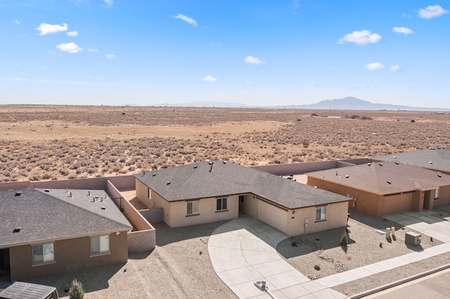2425 Desi Loop, Belen, NM 87002 - aerial view of sparsely populated area featuring a mountainous background and a desert landscape