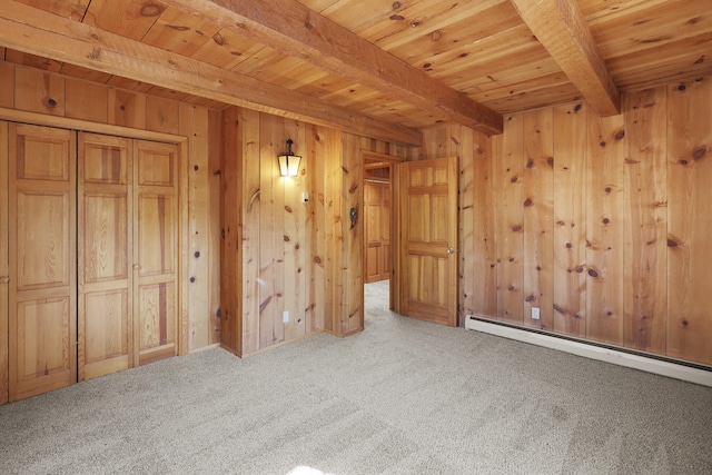 9705 Rio Grande Blvd NW, Albuquerque, NM 87114 - unfurnished bedroom with wooden ceiling with exposed beams, carpet flooring, wood walls, baseboard heating, and a closet