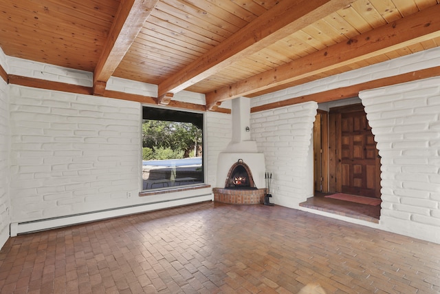 9705 Rio Grande Blvd NW, Albuquerque, NM 87114 - unfurnished living room featuring a baseboard heating unit, wooden ceiling with exposed beams, brick wall, and brick floors