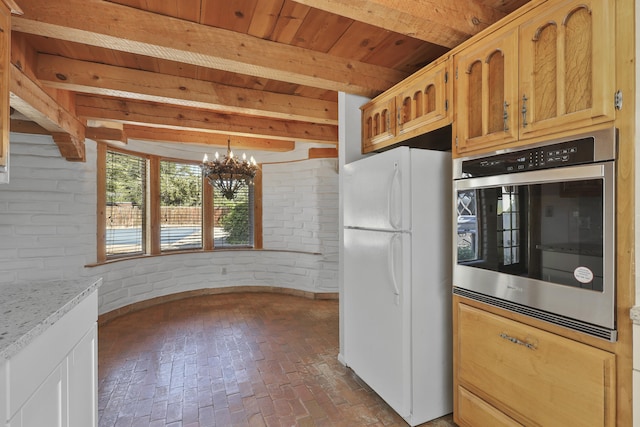 9705 Rio Grande Blvd NW, Albuquerque, NM 87114 - kitchen with freestanding refrigerator, brick wall, oven, brick flooring, and wood ceiling with exposed beams