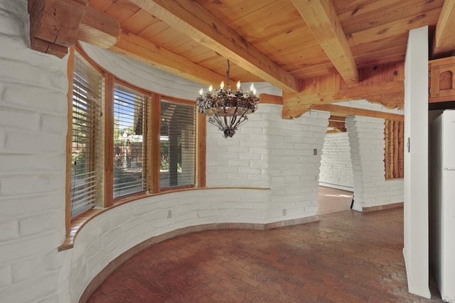 9705 Rio Grande Blvd NW, Albuquerque, NM 87114 - unfurnished dining area with wooden ceiling with exposed beams, brick flooring, a chandelier, and brick wall