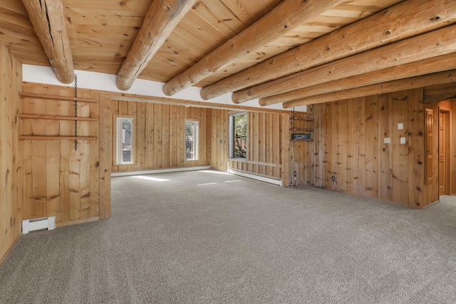 9705 Rio Grande Blvd NW, Albuquerque, NM 87114 - empty room featuring carpet flooring, wood walls, baseboard heating, a baseboard radiator, and wood ceiling with exposed beams