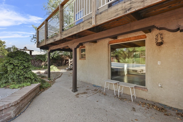 9705 Rio Grande Blvd NW, Albuquerque, NM 87114 - view of patio featuring a deck
