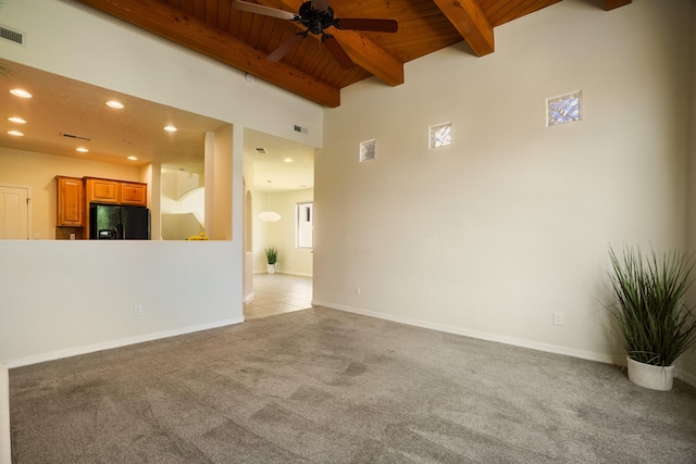 8736 Desert Fox Way NE, Albuquerque, NM 87122 - unfurnished living room featuring carpet flooring, a wooden ceiling with exposed beams, ceiling fan, and recessed lighting