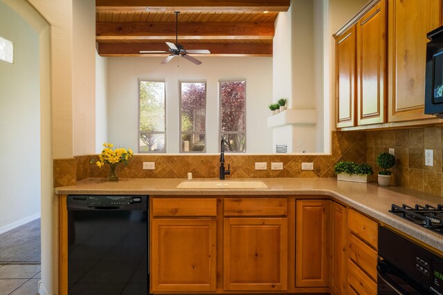 8736 Desert Fox Way NE, Albuquerque, NM 87122 - kitchen featuring black appliances, a wooden ceiling with exposed beams, a ceiling fan, tasteful backsplash, and light countertops