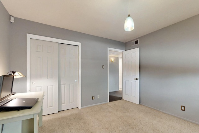 7313 Valley Forge Rd NE, Albuquerque, NM 87109 - unfurnished bedroom with carpet, baseboards, a closet, and an office area