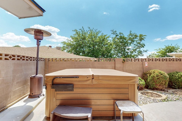 7313 Valley Forge Rd NE, Albuquerque, NM 87109 - fenced backyard with a hot tub and a patio