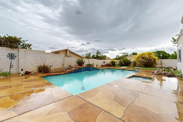 3039 Ashkirk Loop SE, Rio Rancho, NM 87124 - view of pool featuring a patio area, a fenced backyard, and a diving board