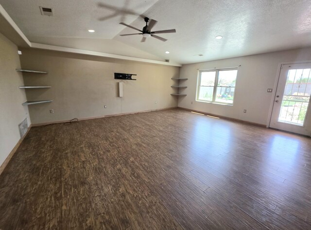 8 Revelations Pl SW, Los Lunas, NM 87031 - unfurnished living room with a ceiling fan, wood finished floors, plenty of natural light, lofted ceiling, and recessed lighting
