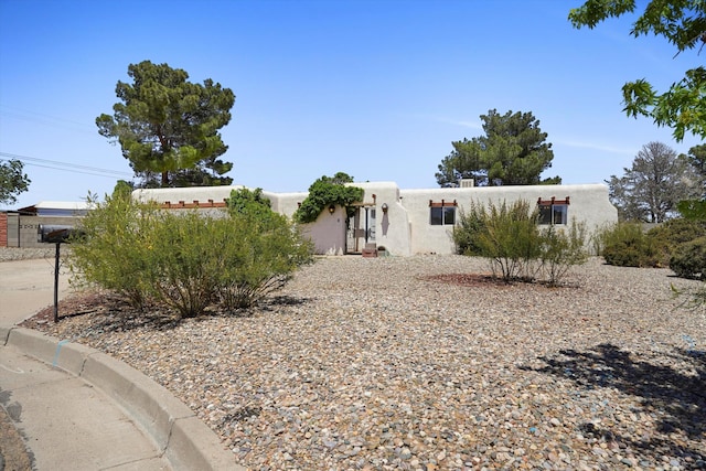 3901 La Frente Ct SE, Rio Rancho, NM 87124 - adobe home with stucco siding