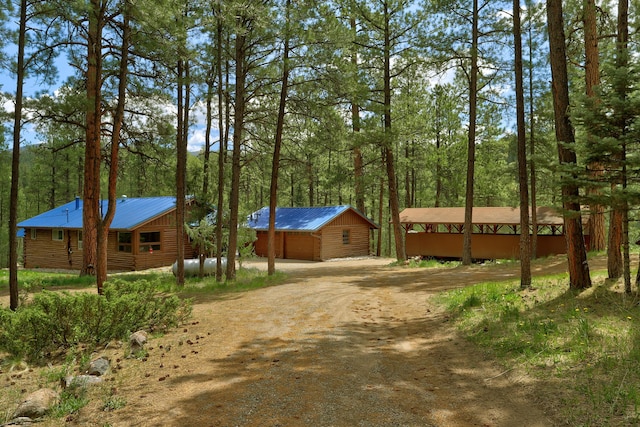 78 Slate Rd, Jemez Springs, NM 87025 - view of dirt / gravel driveway featuring a forest view