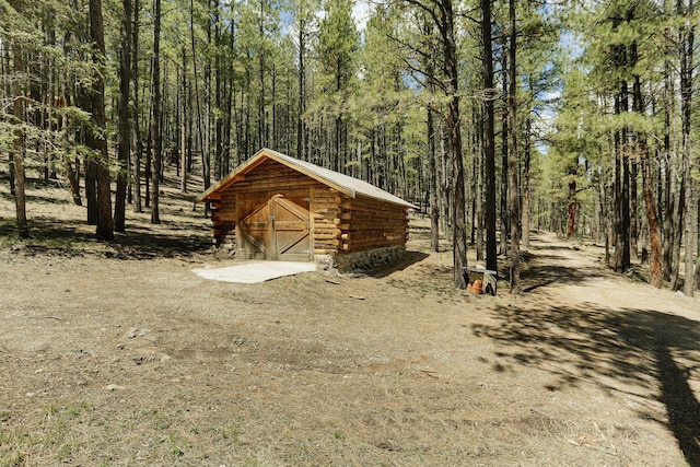 78 Slate Rd, Jemez Springs, NM 87025 - view of shed featuring a wooded view