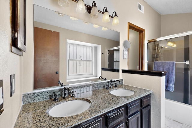 6322 Lamy St NW, Albuquerque, NM 87120 - bathroom featuring a shower with door, double vanity, and a bathtub