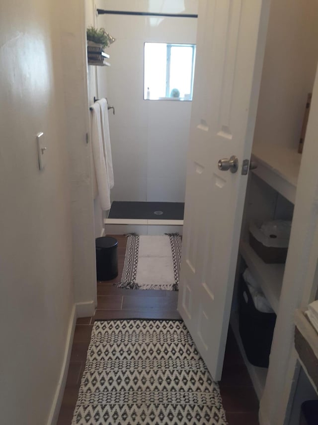 711 Lewis Ave SE, Albuquerque, NM 87102 - bathroom with a walk in shower and baseboards
