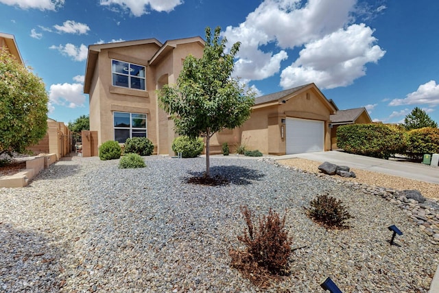 8151 Ventana Cielo Ave NW, Albuquerque, NM 87114 - view of front of property with stucco siding, a garage, driveway, and a gate