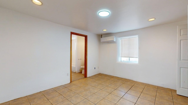 1207 Barelas Rd SW 1203, Albuquerque, NM 87105 - empty room featuring an AC wall unit and recessed lighting