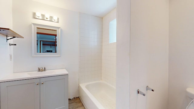 1207 Barelas Rd SW, Albuquerque, NM 87102 - full bathroom with vanity, bathtub / shower combination, and wood finished floors