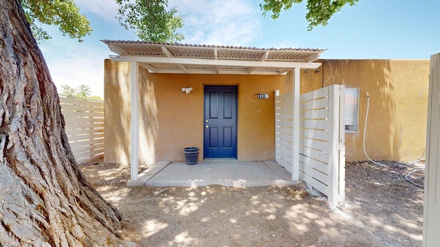 1207 Barelas Rd SW, Albuquerque, NM 87102 - doorway to property with stucco siding