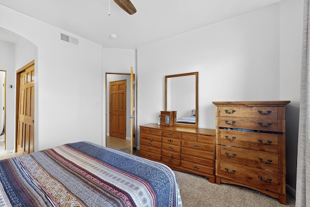 1365 Wilkes Way SE, Rio Rancho, NM 87124 - carpeted bedroom featuring arched walkways and ceiling fan