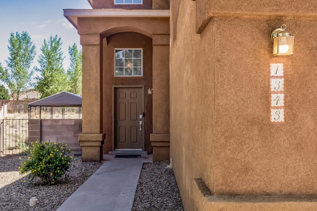 1343 San Juan Ct NE, Rio Rancho, NM 87144 - property entrance featuring stucco siding