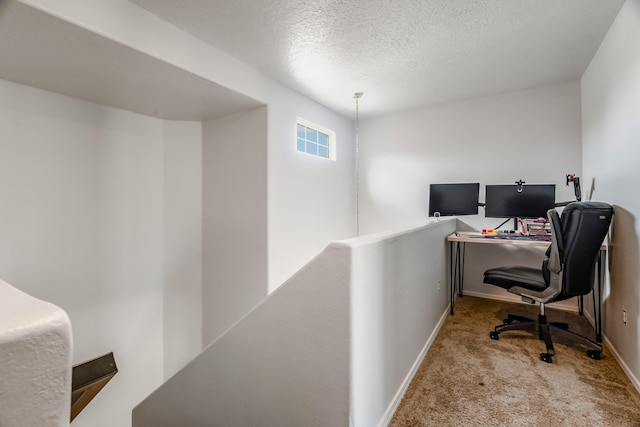 1343 San Juan Ct NE, Rio Rancho, NM 87144 - carpeted office featuring a textured ceiling and baseboards