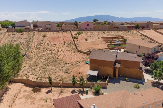 1343 San Juan Ct NE, Rio Rancho, NM 87144 - aerial perspective of suburban area featuring a mountainous background