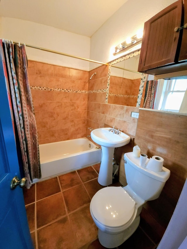 83 Paseo De San Antonio Rd, Placitas, NM 87043 - bathroom featuring shower / bath combination with curtain, tile patterned flooring, and tile walls