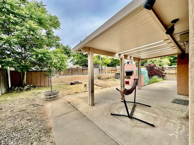 3901 70th St NW, Albuquerque, NM 87120 - fenced backyard featuring a patio