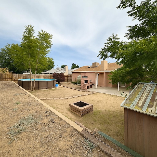 3901 70th St NW, Albuquerque, NM 87120 - fenced backyard featuring a patio