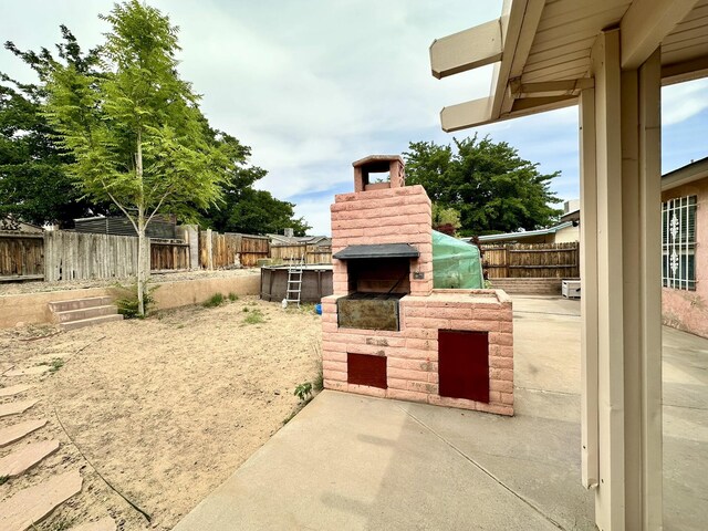 3901 70th St NW, Albuquerque, NM 87120 - fenced backyard featuring a patio