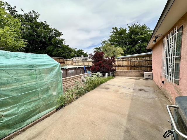 3901 70th St NW, Albuquerque, NM 87120 - fenced backyard featuring a patio