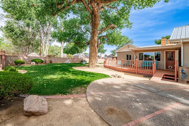 7909 Rancho De Roberto Rd NW, Albuquerque, NM 87114 - view of yard with a wooden deck and a patio area