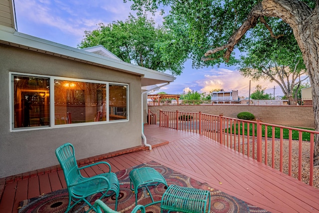 7909 Rancho De Roberto Rd NW, Albuquerque, NM 87114 - view of deck at dusk