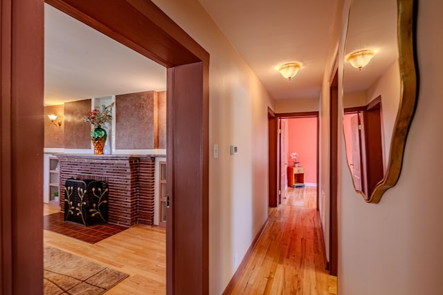 7909 Rancho De Roberto Rd NW, Albuquerque, NM 87114 - corridor with light wood-style flooring and baseboards