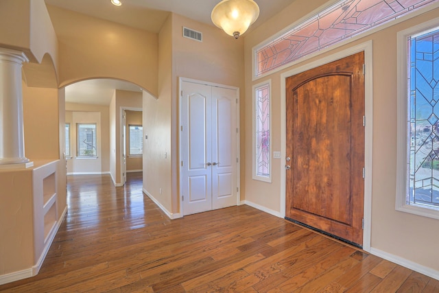 1624 23rd Ave SE, Rio Rancho, NM 87124 - foyer featuring wood-type flooring, healthy amount of natural light, and baseboards