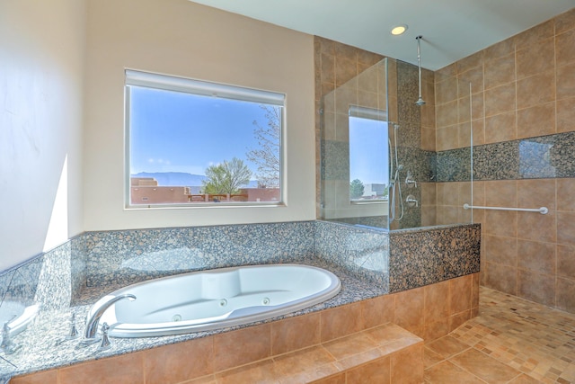 1624 23rd Ave SE, Rio Rancho, NM 87124 - full bath with walk in shower and a whirlpool tub