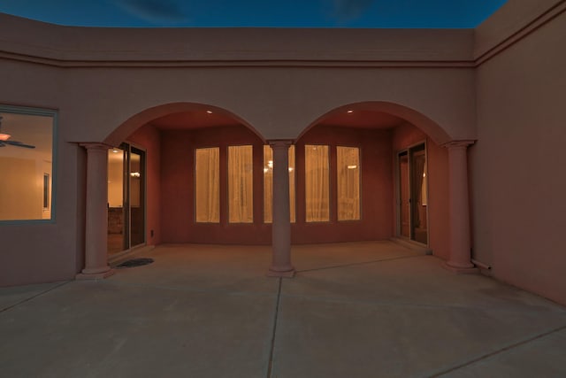 1624 23rd Ave SE, Rio Rancho, NM 87124 - view of exterior entry featuring a patio area and stucco siding