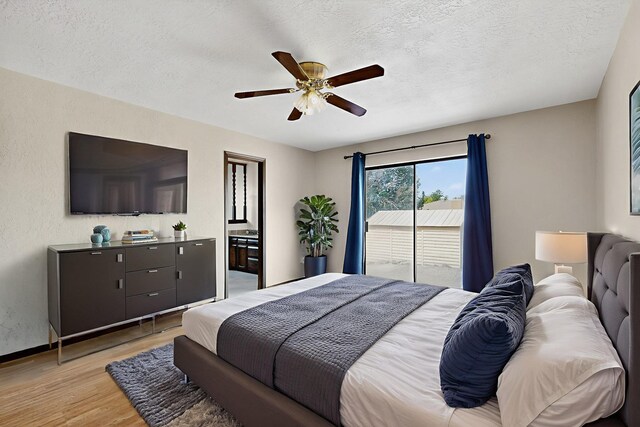 10017 Boulder St NW, Albuquerque, NM 87114 - bedroom with light wood finished floors, access to outside, a textured ceiling, ceiling fan, and connected bathroom