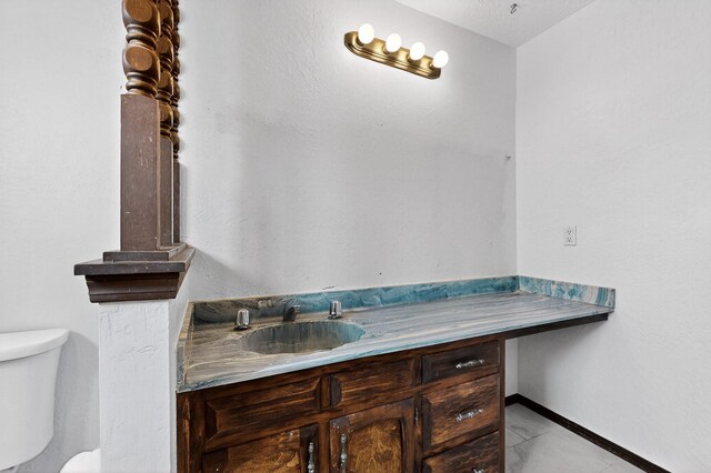 10017 Boulder St NW, Albuquerque, NM 87114 - bathroom featuring toilet and vanity